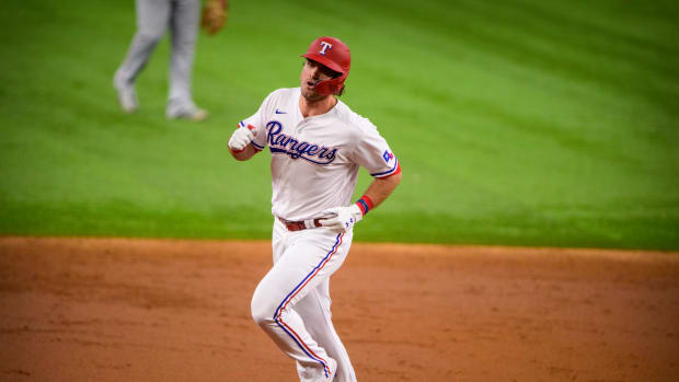 Former Texas Rangers center fielder DJ Peters rounds the bases after a three-run home run in Sept. 2021 at Globe Life Field.